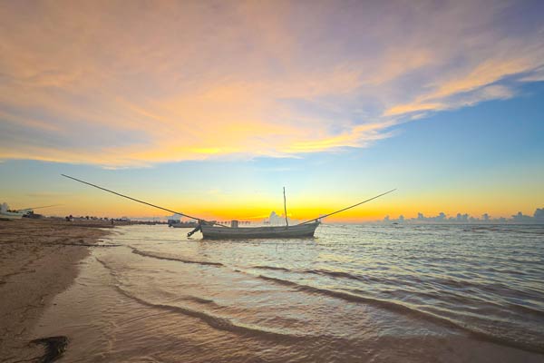 Barcos al Atardecer en el Playón